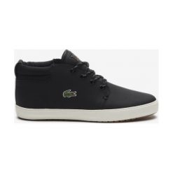 Lacoste Tenisówki Czarny. Czarne trampki i tenisówki damskie Lacoste, bez wzorów, ze skóry, bez zapięcia. Za 516,95 zł.