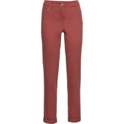 Spodnie ze stretchem chino, "enzyme washed" bonprix brązowy marsala. Spodnie damskie bonprix. Za 44,99 zł.