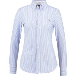Polo Ralph Lauren HEIDI Koszula harbor island blue. Niebieskie koszulki polo damskie marki Polo Ralph Lauren, xl, z bawełny, polo. Za 519,00 zł.