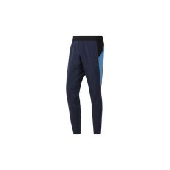 Spodnie treningowe Reebok Sport Spodnie One Series Training Colorblock. Szare spodnie męskie Reebok Sport, s, bez wzorów, sportowe. Za 249,00 zł.
