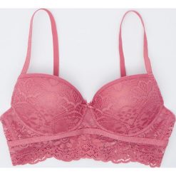 Biustonosz push up z koronką - Różowy. Różowe biustonosze Sinsay, w koronkowe wzory, z koronki. Za 29,99 zł.