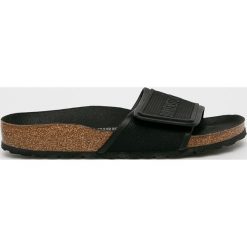 Birkenstock - Klapki Tema. Czarne klapki damskie Birkenstock, bez wzorów, z materiału, bez obcasa, na płaskiej podeszwie. Za 349,90 zł.