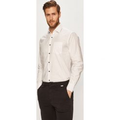 Pierre Cardin - Koszula. Niebieskie koszule męskie Pierre Cardin, bez wzorów, z bawełny, eleganckie, z klasycznym kołnierzykiem, z długim rękawem. W wyprzedaży za 169,90 zł.
