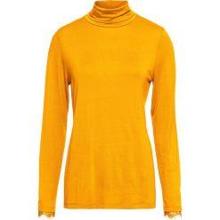 Shirt z golfem i koronką bonprix żółty szafranowy. Żółte koszulki damskie bonprix, w koronkowe wzory, z koronki, bez rękawów. Za 37,99 zł.
