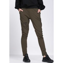 Ciemnozielone Spodnie Dresowe Drama. Zielone spodnie dresowe damskie Born2be, s, z dresówki. Za 54,99 zł.