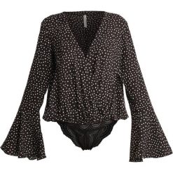 Free People MAKIN WAVES Body black. Czarne body damskie marki Free People, s, bez wzorów, z wiskozy. Za 349,00 zł.