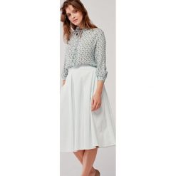 Spódnica Adanel błękitna kratka 32 niebieski. Niebieskie spódniczki damskie Marie Zélie, na wiosnę, w paski, z elastanu, trapezowe. Za 297,00 zł.