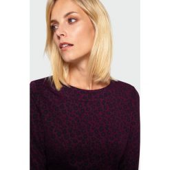 Wzorzysta bluzka dzianinowa. Bluzki damskie Greenpoint, bez wzorów, z elastanu, bez kołnierzyka, bez rękawów. Za 69,99 zł.