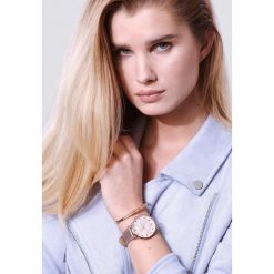 Złota Bransoletka Determining. Żółte bransoletki damskie Born2be, z cyrkonią, złote. Za 29,99 zł.