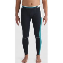 Sportowe legginsy. Niebieskie kalesony męskie marki DIM SPORT, z dresówki. Za 146,96 zł.