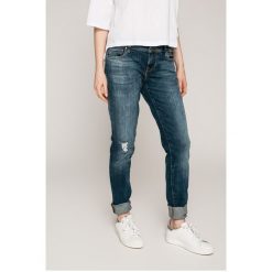 Guess Jeans - Jeansy STARLET. Niebieskie jeansy damskie rurki marki Guess Jeans, l, z aplikacjami, z bawełny, z obniżonym stanem. W wyprzedaży za 249,90 zł.
