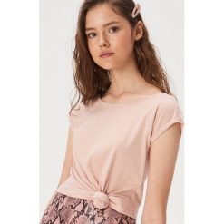 Bawełniana koszulka basic - Różowy. Różowe koszulki damskie Sinsay, xl, bez wzorów, z bawełny, bez kołnierzyka, bez rękawów. Za 9,99 zł.