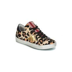 Buty Meline ARGAGAROU. Pomarańczowe trampki i tenisówki damskie marki Meline, bez wzorów, bez zapięcia. Za 529,00 zł.