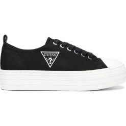 Guess Brigs Tenisówki Czarny. Czarne trampki i tenisówki damskie Guess, z aplikacjami, z materiału, bez zapięcia. Za 373,95 zł.