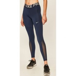 Nike - Legginsy. Niebieskie spodnie damskie Nike, s, z elastanu. W wyprzedaży za 139,90 zł.