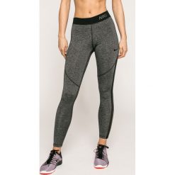 Nike - Legginsy. Szare spodnie damskie Nike, s, z elastanu. W wyprzedaży za 199,90 zł.