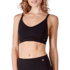 Top damski Skiny Yoga Relax Performance 085088. Koszulki damskie Skiny, bez wzorów, bez kołnierzyka, bez rękawów. Za 139,00 zł.