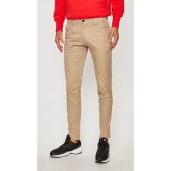 Tommy Jeans - Spodnie. Szare spodnie męskie Tommy Jeans, bez wzorów, z elastanu. W wyprzedaży za 249,90 zł.