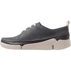 Clarks TRI CLARA Sznurowane obuwie sportowe dark grey. Niebieskie buty sportowe damskie Clarks, z materiału. Za 389,00 zł.