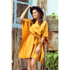 Kristi sukienka motyl - miodowa. Pomarańczowe sukienki damskie numoco, s, bez wzorów, z elastanu, bez kołnierzyka, bez rękawów. Za 159,90 zł.