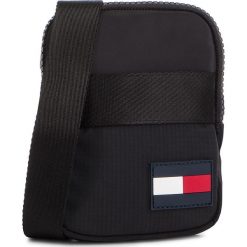 Saszetka TOMMY HILFIGER - Tommy Compact Xover Sports Tape AM0AM04628 002. Czarne torby męskie skórzane TOMMY HILFIGER, bez wzorów, z materiału, młodzieżowe. W wyprzedaży za 139,00 zł.