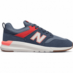 New Balance WS009RD1. Pomarańczowe buty sportowe damskie New Balance, bez wzorów, z gumy, klasyczne. Za 279,99 zł.