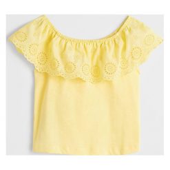 Mango Kids - Bluzka dziecięca Sonia 110-164 cm. Białe bluzki dziewczęce Mango Kids, bez wzorów, z bawełny, bez kołnierzyka, bez rękawów, bez kaptura. W wyprzedaży za 47,90 zł.
