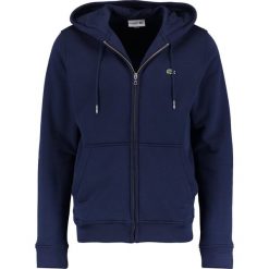 Lacoste Bluza rozpinana marine. Niebieskie bluzy męskie rozpinane marki Lacoste, xxl, z bawełny. Za 519,00 zł.