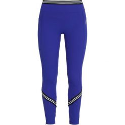 Free People ZEPHYR Legginsy blue. Niebieskie spodnie damskie marki Free People, xs, z elastanu. Za 409,00 zł.
