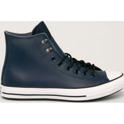 Converse - Trampki skórzane. Niebieskie trampki męskie Converse, bez wzorów, ze skóry, na sznurówki. W wyprzedaży za 259,90 zł.
