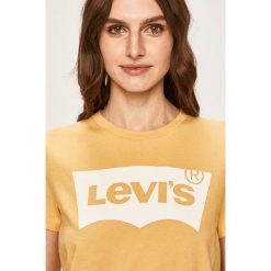 Levi's - T-shirt. Żółte bluzki damskie Levi's®, s, z nadrukiem, z bawełny, z okrągłym kołnierzem. Za 129,90 zł.