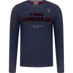 T-shirt AERONAUTICA MILITARE Granatowy. Niebieskie t-shirty męskie marki Aeronautica Militare, m, z napisami, z włoskim kołnierzykiem. Za 245,00 zł.