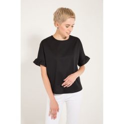 Bluzka w kolorze czarnym. Czarne bluzki damskie Bessa, Moonlight, bez wzorów, z okrągłym kołnierzem, bez rękawów. W wyprzedaży za 112,95 zł.