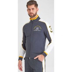 BLUZA Aeronautica Militare. Niebieskie bluzy męskie Aeronautica Militare, xxl, bez wzorów, bez kołnierzyka, bez rękawów, bez kaptura. Za 829,00 zł.