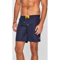 Guess Jeans - Kąpielówki. Niebieskie kąpielówki męskie Guess Jeans, m, z aplikacjami, z poliesteru. W wyprzedaży za 159,90 zł.