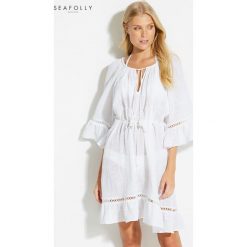 Tunika plażowa Seafolly Sea Stripe 53358-CU. Niebieskie tuniki plażowe damskie Seafolly, na plażę, bez wzorów, bez kołnierzyka, bez rękawów. Za 335,00 zł.
