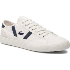Tenisówki LACOSTE - Sideline 119 1 Cma Off 7-37CMA0066WN1 Wht/Nvy. Białe półbuty męskie Lacoste, ze skóry, eleganckie. W wyprzedaży za 259,00 zł.