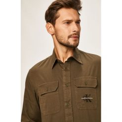 Calvin Klein Jeans - Koszula. Czarne koszule męskie Calvin Klein Jeans, m, bez wzorów, z bawełny, klasyczne, z klasycznym kołnierzykiem, z długim rękawem. W wyprzedaży za 249,90 zł.