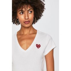 G-Star Raw - Top. Białe bluzki damskie marki G-Star RAW, s, z nadrukiem, z bawełny, retro, bez kołnierzyka, z krótkim rękawem. Za 139,90 zł.