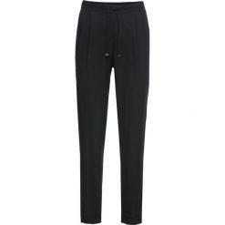 Spodnie Loose Fit bonprix czarny. Czarne spodnie damskie bonprix. Za 109,99 zł.