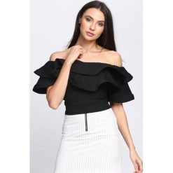 Czarna Bluzka Warrior Princess. Czarne bluzki damskie Born2be, s, bez wzorów, z dzianiny, bez kołnierzyka, bez rękawów. Za 59,99 zł.