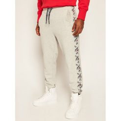 Spodnie dresowe Tommy Jeans Corp DM0DM07197. Szare jeansy męskie Tommy Jeans, xxl, bez wzorów, z jeansu. W wyprzedaży za 209,00 zł.