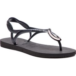 Sandały HAVAIANAS - Luna Special Cf 41351641069 Black. Czarne klapki damskie Havaianas, bez wzorów, z tworzywa sztucznego, bez obcasa. W wyprzedaży za 149,00 zł.