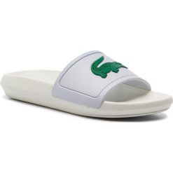 Klapki LACOSTE - Croco Slide 119 3 Cfa 7-37CFA0005082 White/Green. Białe klapki damskie Lacoste, bez wzorów, z tworzywa sztucznego, bez obcasa. W wyprzedaży za 139,00 zł.