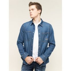 Koszula Calvin Klein Jeans Iconic Denim J30J313978. Niebieskie koszule męskie Calvin Klein Jeans, xl, bez wzorów, z bawełny, casualowe, bez kołnierzyka, bez rękawów. W wyprzedaży za 299,00 zł.