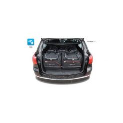 OPEL ASTRA TOURER, 2009-2015 TORBY DO BAGAŻNIKA 5 SZT KJUST - 7031027. Torby podróżne KJUST, bez wzorów, z kauczuku, klasyczne. Za 1369,00 zł.