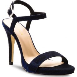 Sandały MENBUR - 09573 Midnight Blue 0021. Niebieskie klapki damskie Menbur, z aplikacjami, ze skóry ekologicznej, bez obcasa, na obcasie. W wyprzedaży za 229,00 zł.