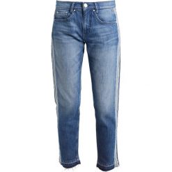 Freeman T. Porter SOLENN Jeansy Slim Fit blue. Niebieskie rurki damskie Freeman T. Porter, bez wzorów, z elastanu. W wyprzedaży za 439,20 zł.