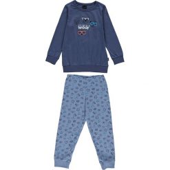 Piżama w kolorze niebieskim. Niebieskie bielizna chłopięca marki Schiesser Kids, bez wzorów, z bawełny. W wyprzedaży za 49,95 zł.