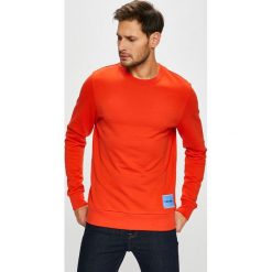 Calvin Klein - Bluza. Niebieskie bluzy męskie Calvin Klein, s, bez wzorów, z dzianiny, z okrągłym kołnierzem, bez rękawów, bez kaptura. W wyprzedaży za 319,90 zł.